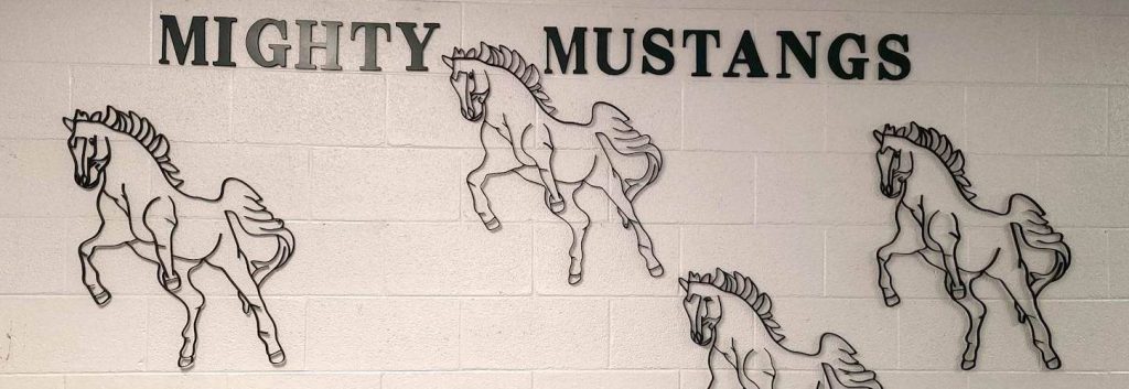 Mighty Mustangs wall inside the school